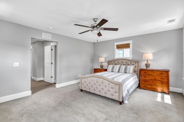 bedroom with baseboards, visible vents, and carpet flooring