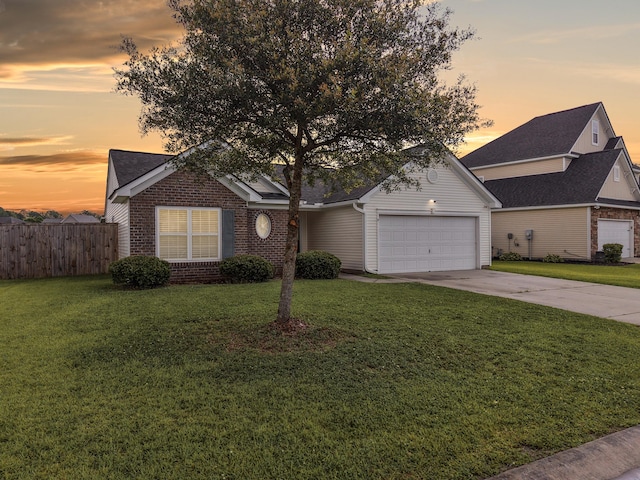 224 Market Hall St, Moncks Corner, SC 29461 - view of front facade with an attached garage, driveway, and brick siding