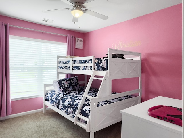 224 Market Hall St, Moncks Corner, SC 29461 - carpeted bedroom featuring multiple windows, baseboards, and a ceiling fan