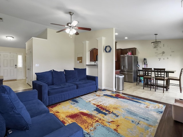 224 Market Hall St, Moncks Corner, SC 29461 - living area featuring a ceiling fan, recessed lighting, baseboards, vaulted ceiling, and arched walkways