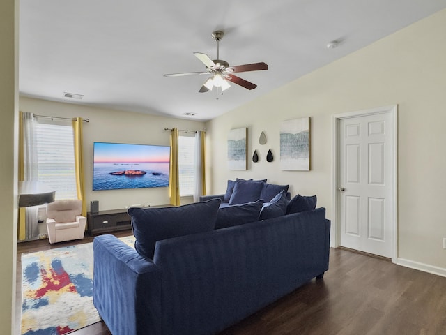 224 Market Hall St, Moncks Corner, SC 29461 - living room featuring dark wood-type flooring, a ceiling fan, vaulted ceiling, and baseboards
