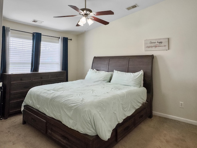 224 Market Hall St, Moncks Corner, SC 29461 - bedroom with light colored carpet, baseboards, and a ceiling fan