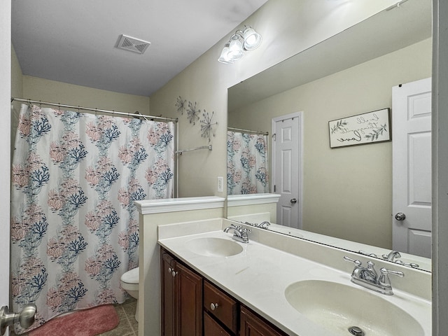 224 Market Hall St, Moncks Corner, SC 29461 - full bathroom with toilet, double vanity, tile patterned floors, and a shower with curtain