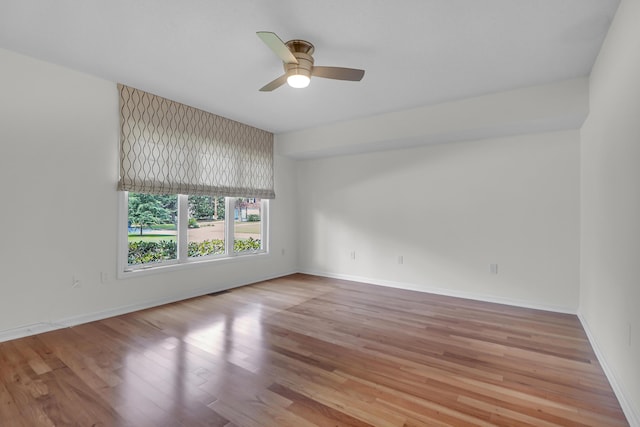 919 Overview Ct, Mount Pleasant, SC 29464 - empty room with wood finished floors, ceiling fan, and baseboards