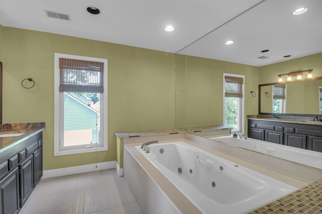 919 Overview Ct, Mount Pleasant, SC 29464 - full bathroom with vanity, a tub with jets, baseboards, recessed lighting, and tile patterned floors
