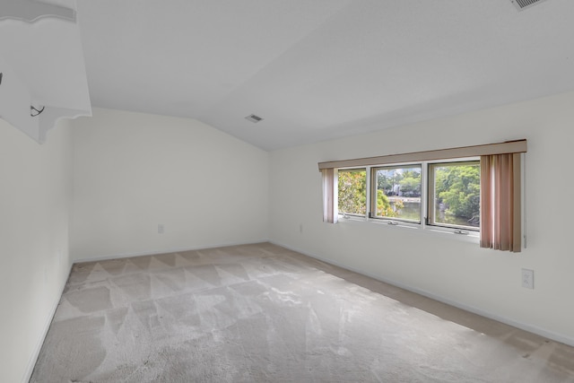 919 Overview Ct, Mount Pleasant, SC 29464 - spare room with lofted ceiling, light carpet, and baseboards