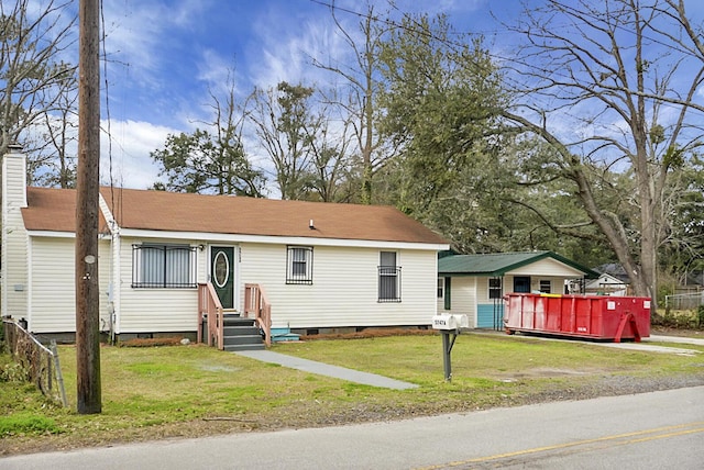 view of front of home featuring a front yard