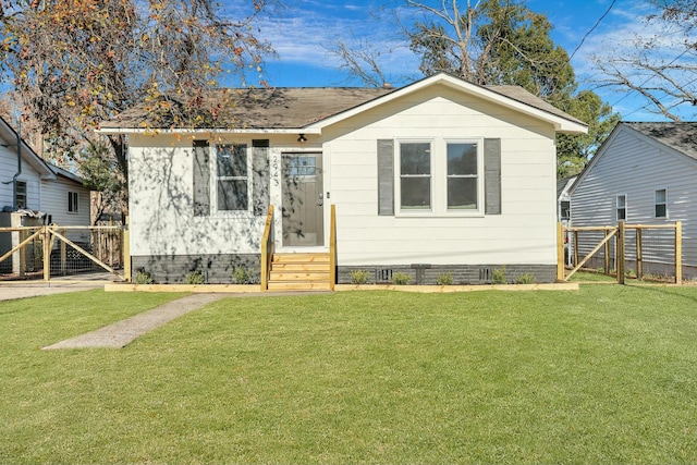 bungalow with a front lawn