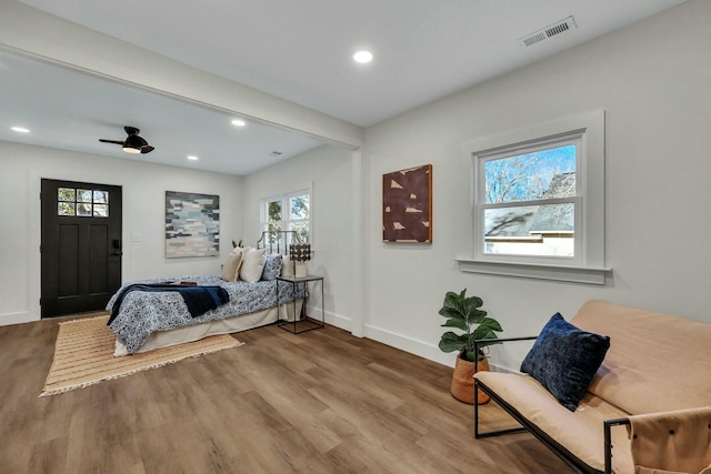 bedroom with hardwood / wood-style flooring