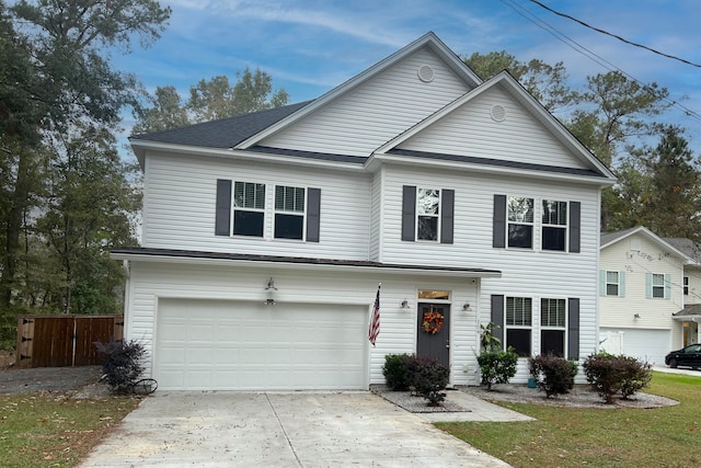 view of property featuring a garage