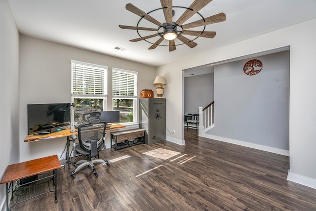 office space with ceiling fan and dark hardwood / wood-style floors