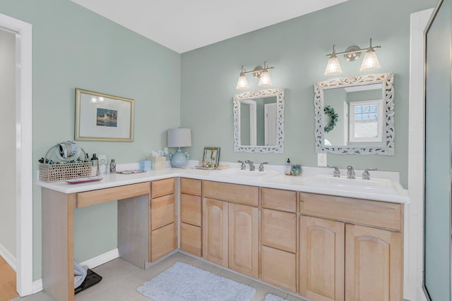 bathroom featuring double vanity, tile patterned flooring, and a sink