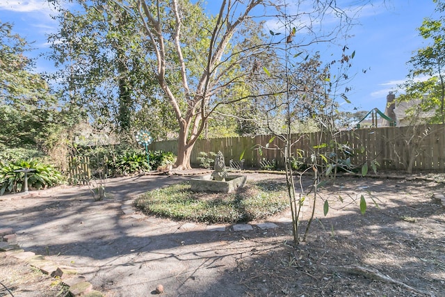 view of yard featuring fence