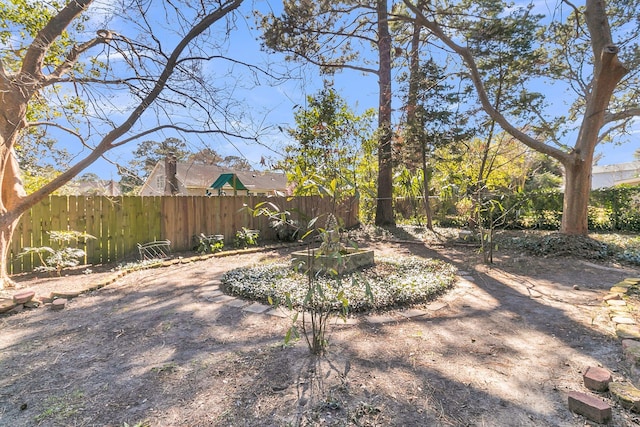 view of yard with fence