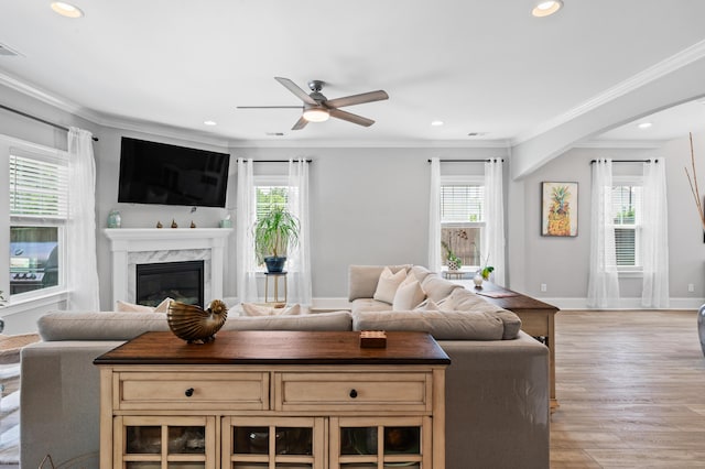 2802 Cavalcade Cir, Johns Island, SC 29455 - living room with healthy amount of natural light, ceiling fan, recessed lighting, a high end fireplace, and ornamental molding