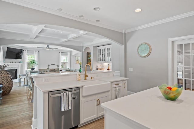 2802 Cavalcade Cir, Johns Island, SC 29455 - kitchen with dishwasher, a sink, open floor plan, ceiling fan, and a center island with sink