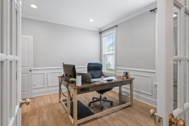 2802 Cavalcade Cir, Johns Island, SC 29455 - home office with ornamental molding, a decorative wall, light wood-style floors, and a wainscoted wall