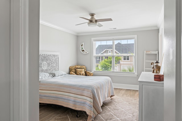 2802 Cavalcade Cir, Johns Island, SC 29455 - bedroom with wood finished floors, ornamental molding, baseboards, and a ceiling fan