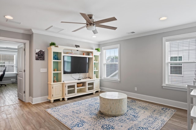 2802 Cavalcade Cir, Johns Island, SC 29455 - living area with a ceiling fan, light wood-type flooring, baseboards, crown molding, and recessed lighting