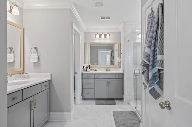 2802 Cavalcade Cir, Johns Island, SC 29455 - bathroom with marble finish floors, a stall shower, ornamental molding, two vanities, and baseboards