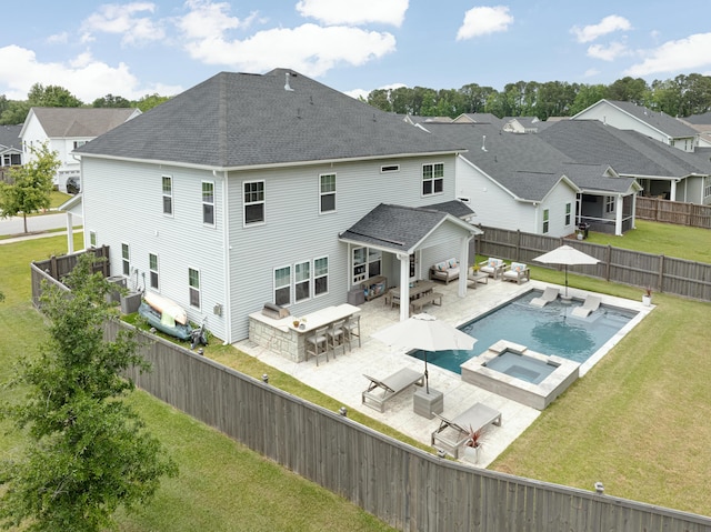 2802 Cavalcade Cir, Johns Island, SC 29455 - rear view of house featuring an outdoor living space, a patio, an in-ground hot tub, outdoor dining space, and a shingled roof