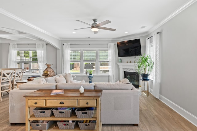 2802 Cavalcade Cir, Johns Island, SC 29455 - living area with ceiling fan, ornamental molding, a fireplace, light wood-type flooring, and recessed lighting