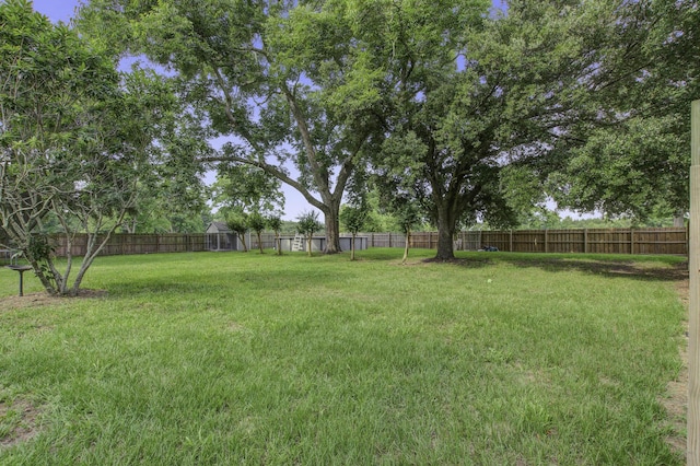 view of yard featuring fence