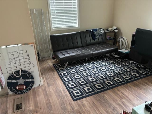 living room with dark wood-type flooring