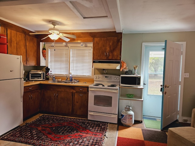 3695 Cannon Rd, Round O, SC 29474 - kitchen featuring white appliances, a toaster, light countertops, under cabinet range hood, and a sink