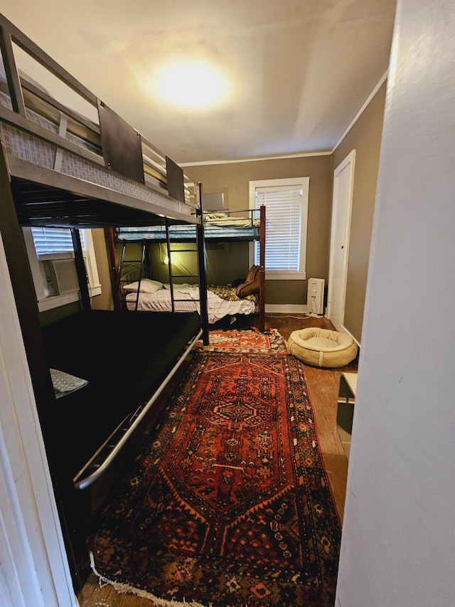 3695 Cannon Rd, Round O, SC 29474 - bedroom with ornamental molding, wood finished floors, and baseboards