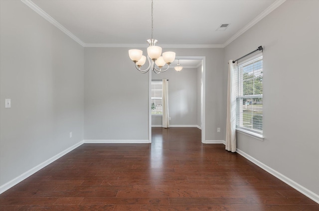 unfurnished room with ornamental molding, an inviting chandelier, and dark wood-type flooring