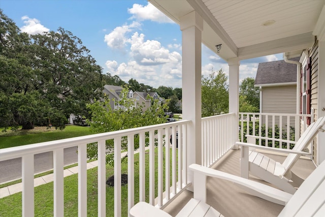 balcony featuring a porch