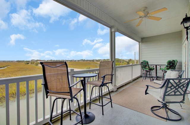 balcony featuring ceiling fan