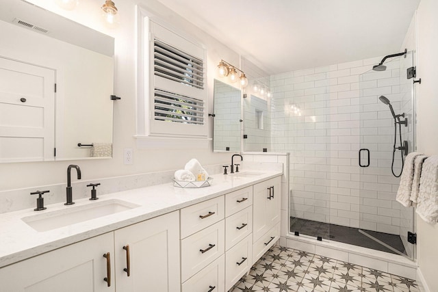 bathroom featuring vanity and walk in shower