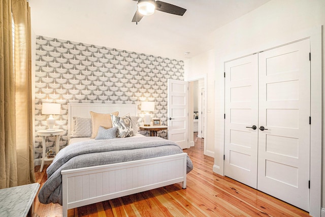 bedroom with hardwood / wood-style flooring and ceiling fan