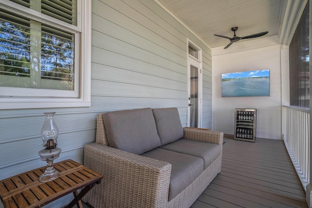 deck featuring wine cooler and ceiling fan