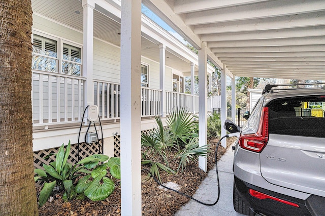 view of side of property featuring a carport