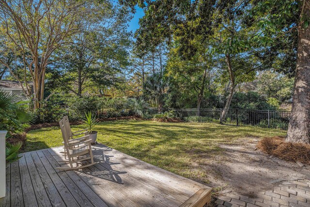 view of yard with a wooden deck