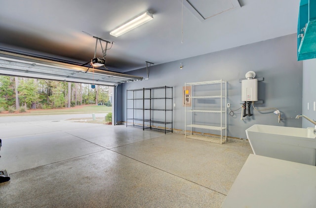 garage with a garage door opener and sink