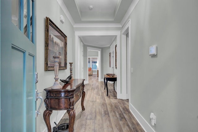 hallway with hardwood / wood-style flooring