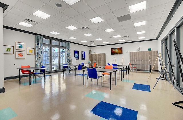 playroom featuring a paneled ceiling and ornamental molding