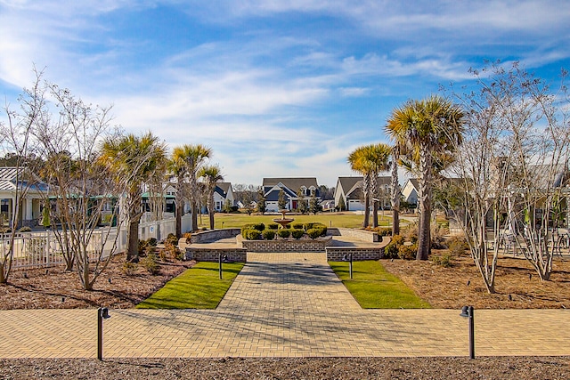 surrounding community featuring a lawn