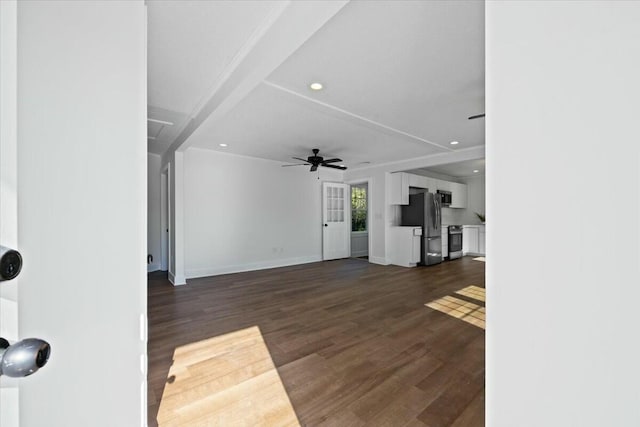 unfurnished living room featuring dark wood-type flooring, recessed lighting, baseboards, and ceiling fan