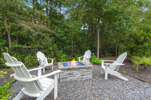 view of patio with an outdoor fire pit