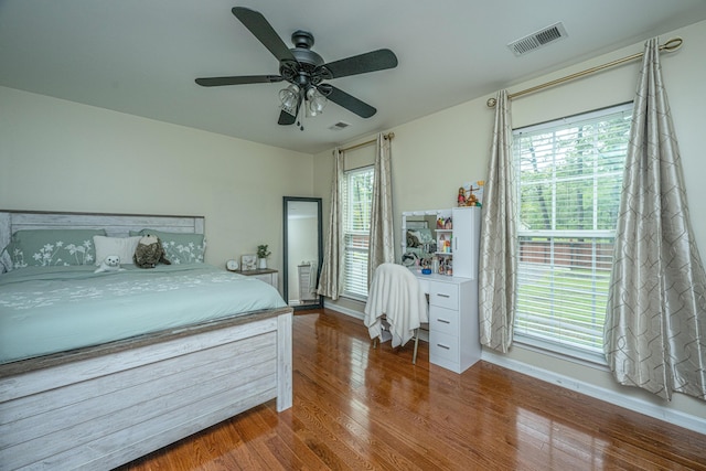 unfurnished bedroom with hardwood / wood-style floors and ceiling fan