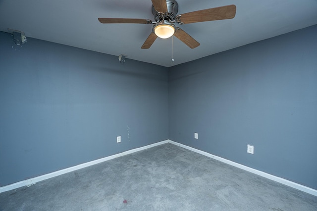 spare room with ceiling fan and carpet floors