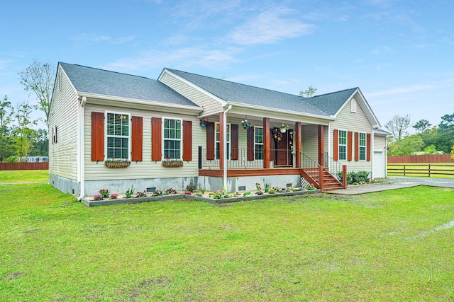 view of front of property with a front yard and a porch