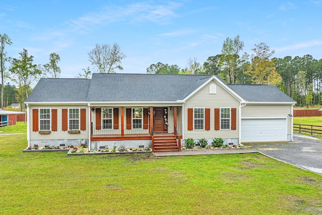 ranch-style house featuring a front lawn, a porch, and a garage