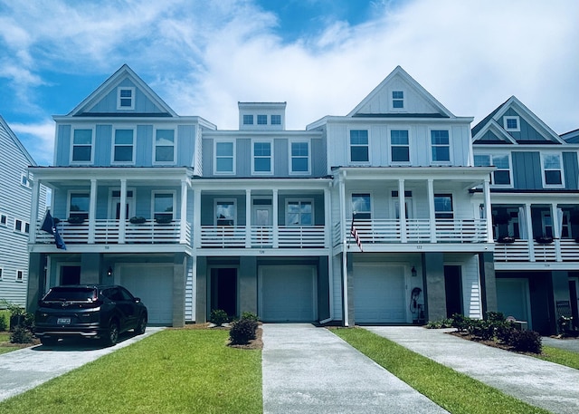320 Laurens View Ln, Charleston, SC 29492 - view of front of house with a garage, a front yard, driveway, and a balcony