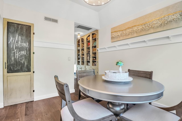 dining room featuring dark hardwood / wood-style floors